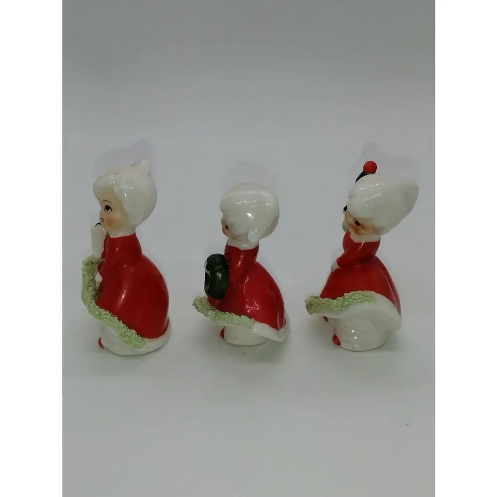 Vintage Enesco? Trio of Ceramic Carolers in Red Dresses with Spaghetti Trim